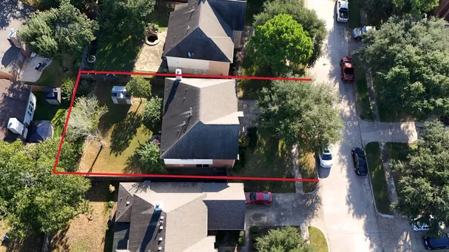 an aerial view of street and entrance