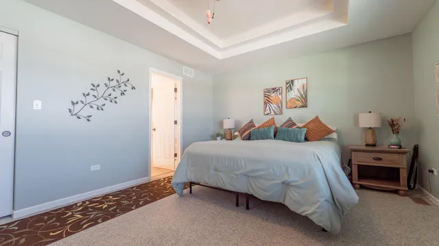 a bed room with a bed and a couch