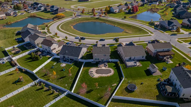 an aerial view of a pool patio swimming pool and outdoor seating