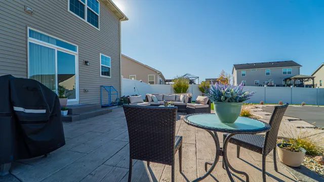a view of a patio with furniture