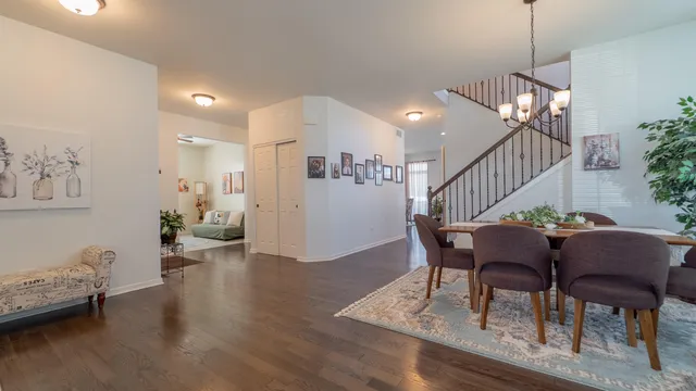 a view of a livingroom with furniture and wooden floor