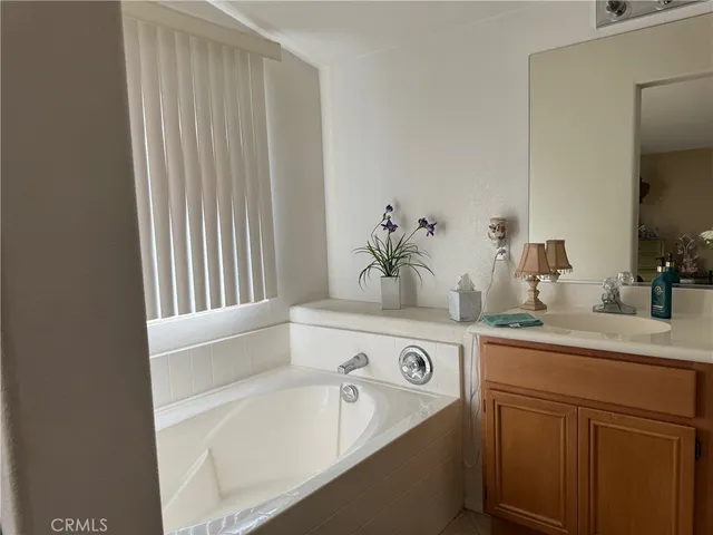 a bathroom with a sink and a bathtub