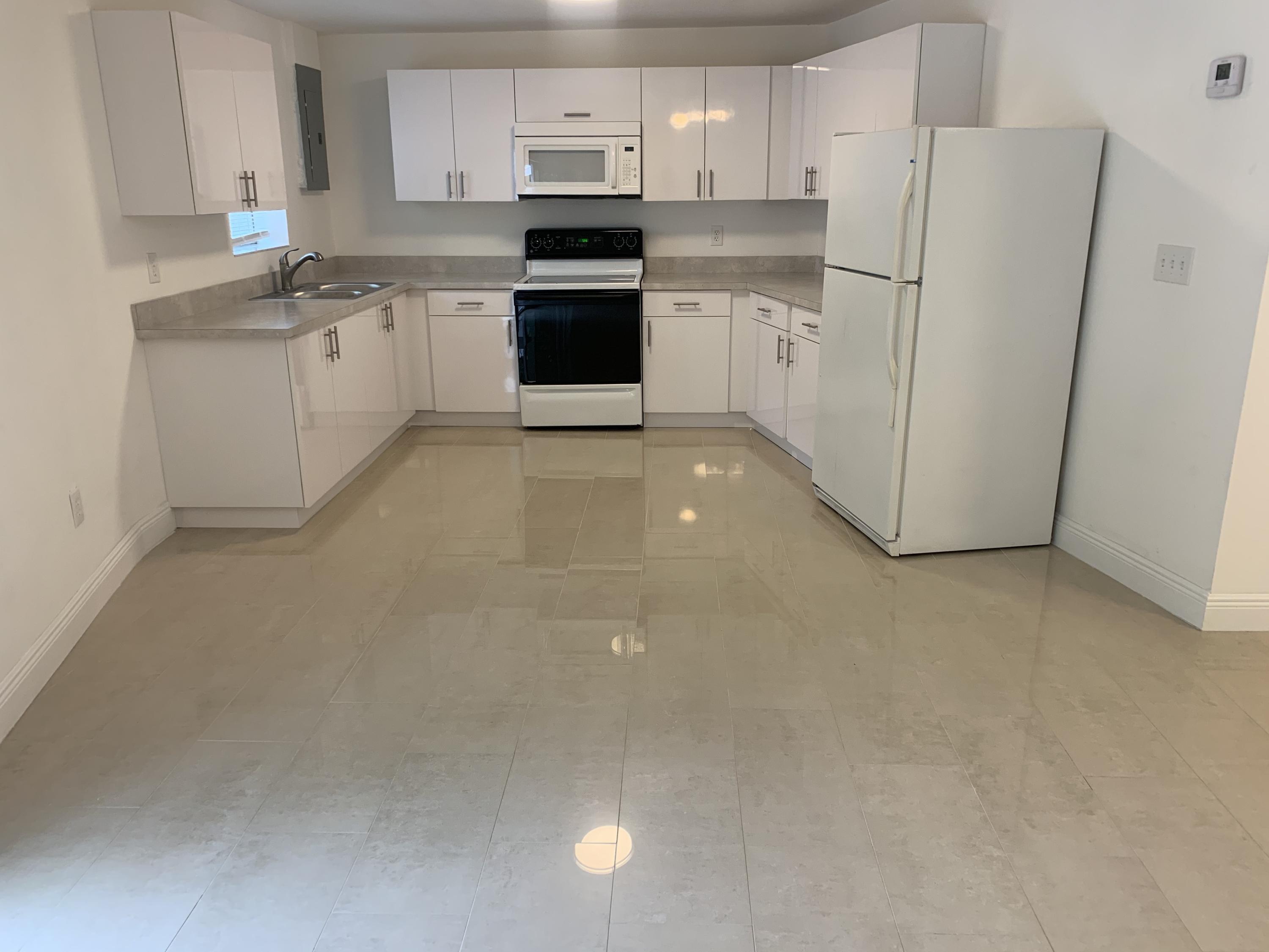 1097 Wilkinson Road Lantana, FL 33462 - Photo 3 of 11 Xjb3DwK5TtKQJELLWBBnqQ