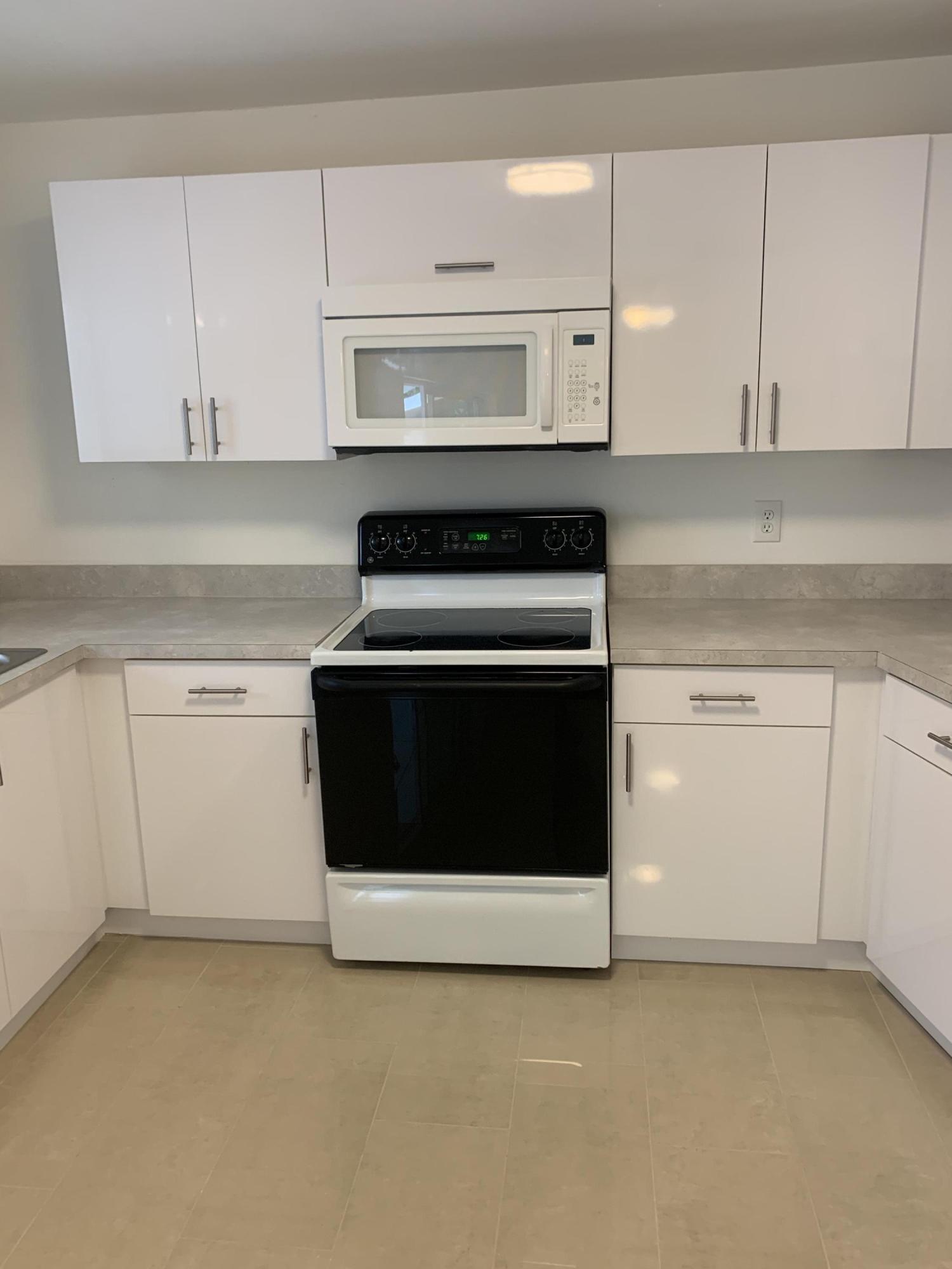 1097 Wilkinson Road Lantana, FL 33462 - Photo 4 of 11 mhAjedRwSEisUI6ljak9HQ