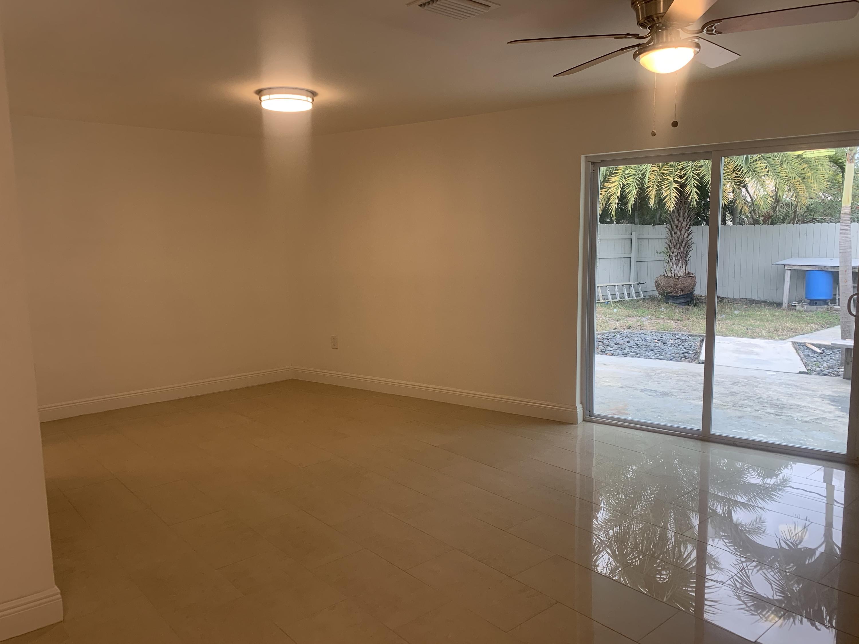 1097 Wilkinson Road Lantana, FL 33462 - Photo 7 of 11 GEs+B2GwR2mZSxybhkmyVA