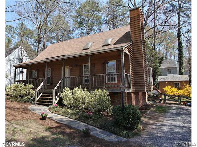 2919 Shiloh Church Road Midlothian, VA 23112 - Photo 1 of 24 a front view of a house with garden