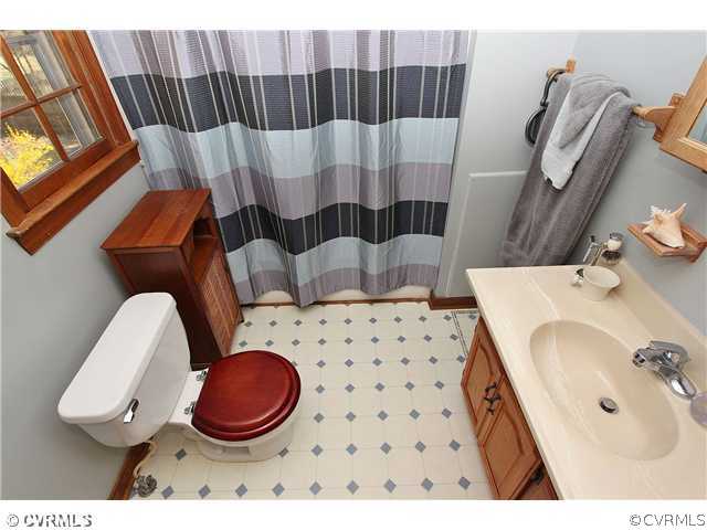 2919 Shiloh Church Road Midlothian, VA 23112 - Photo 21 of 24 a bathroom with a sink toilet and shower