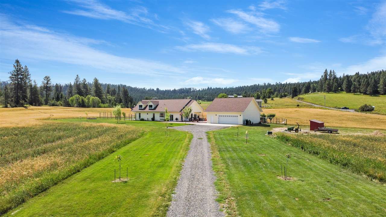 9110 East Woolard Road Colbert, WA 99005 - Photo 1 of 47