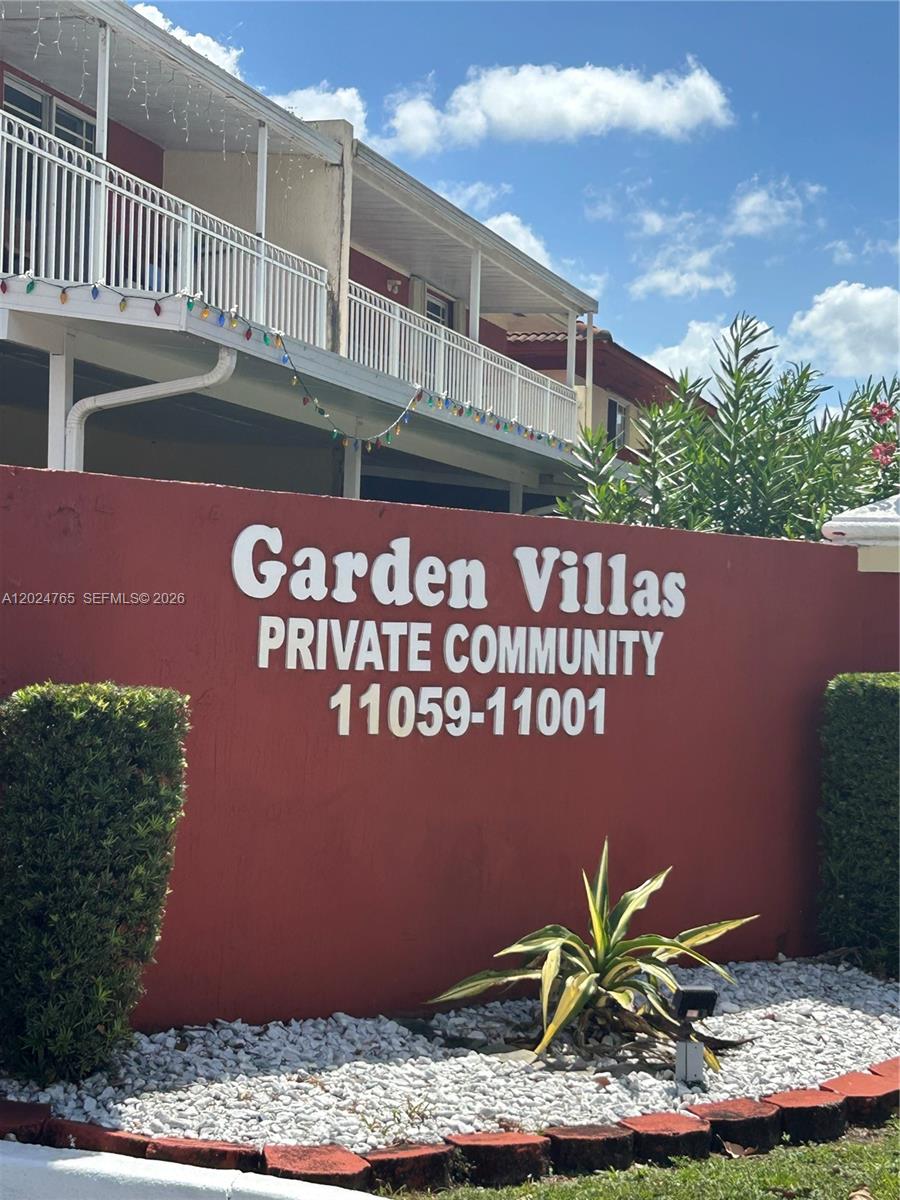 10919 West Okeechobee Road, Unit 101 Hialeah Gardens, FL 33018 - Photo 1 of 21 a front view of a house