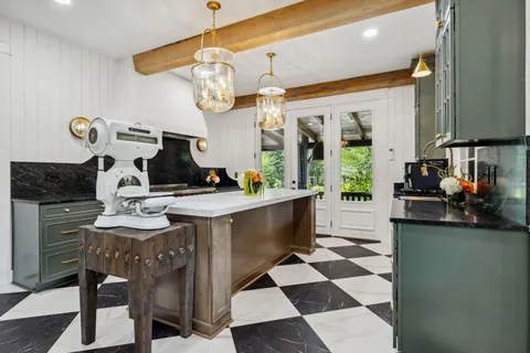 a view of an chairs and tables in the patio