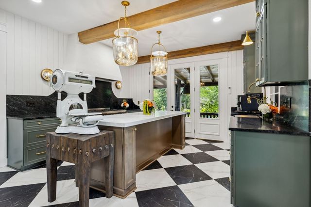a view of an chairs and tables in the patio