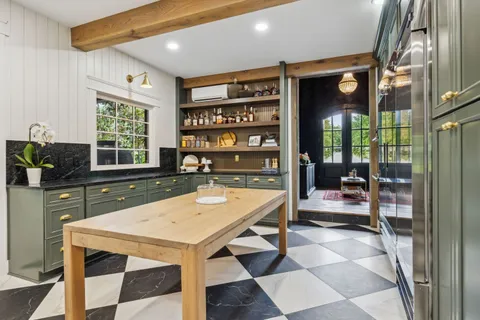 a view of a porch with wooden floor