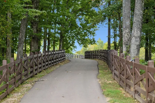 a stove top oven sitting inside of a kitchen