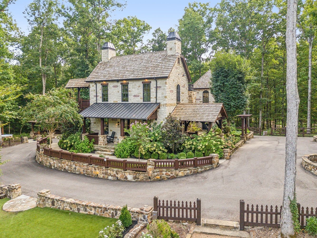 5715 Greenbrier Road Franklin, TN 37064 - Photo 34 of 72 a house with lots of trees in the background