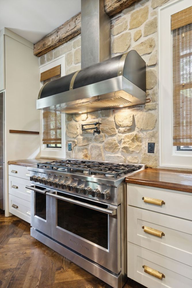 5715 Greenbrier Road Franklin, TN 37064 - Photo 42 of 72 a stove top oven sitting inside of a kitchen