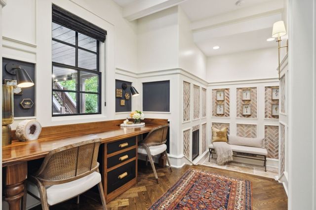 a lake view with a sitting space and garden