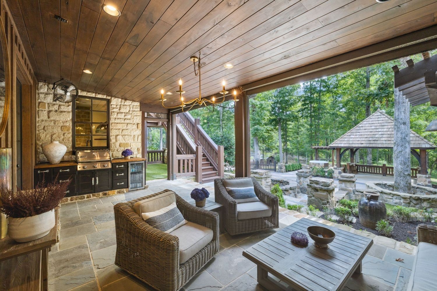 5715 Greenbrier Road Franklin, TN 37064 - Photo 52 of 72 a outdoor space with patio the couches and pool table with chairs and potted plants