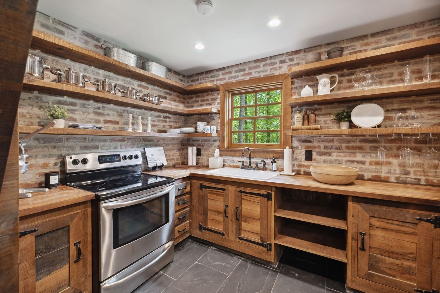 5715 Greenbrier Road Franklin, TN 37064 - Photo 61 of 72 a kitchen with a stove and a sink