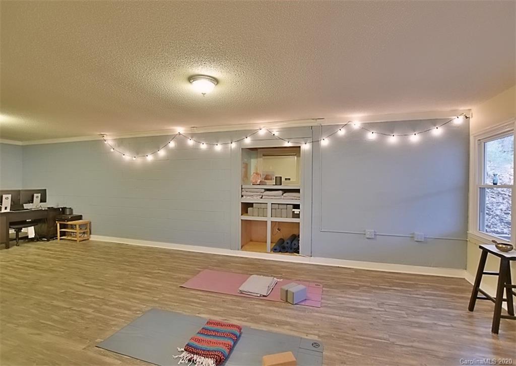 11068 Deep Cove Drive Tega Cay, SC 29708 - Photo 26 of 34 a view of a room with gym equipment