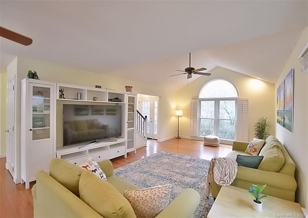 11068 Deep Cove Drive Tega Cay, SC 29708 - Photo 10 of 34 a living room with furniture and a flat screen tv