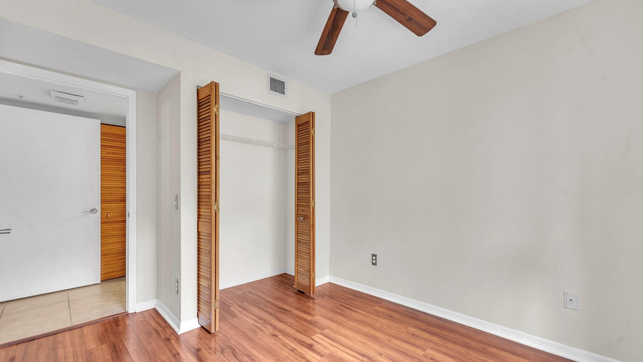 430 South Park Road, Unit 3303 Hollywood, FL 33021 - Photo 15 of 27 an empty room with wooden floor and windows