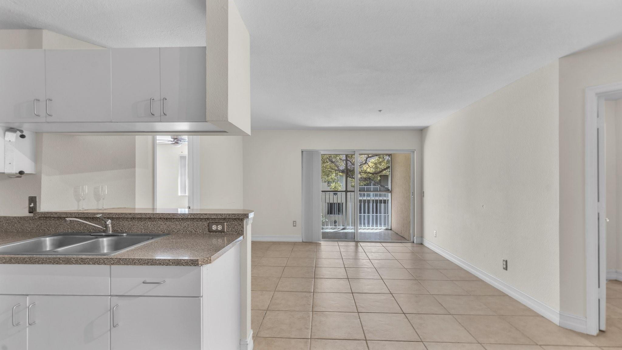 430 South Park Road, Unit 3303 Hollywood, FL 33021 - Photo 4 of 27 a view of a kitchen with a sink and dishwasher