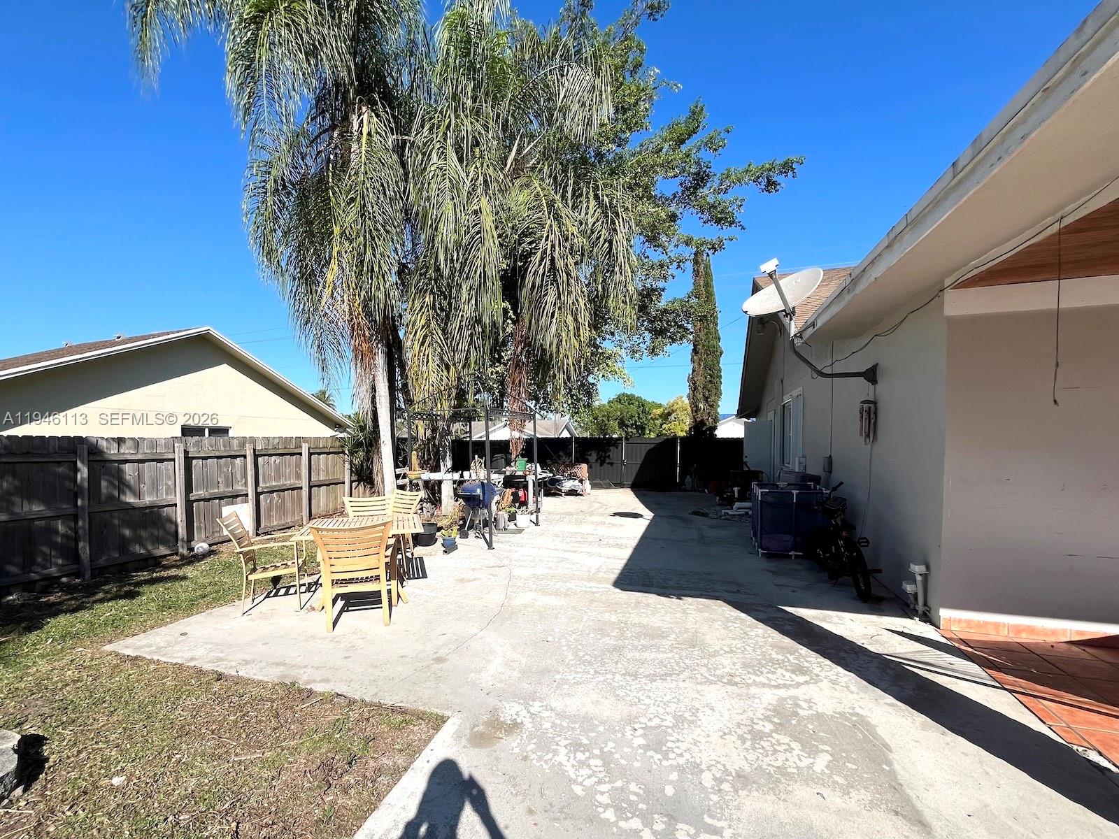 16200 Southwest 284th Street Homestead, FL 33033 - Photo 23 of 23 a view of a backyard with a patio
