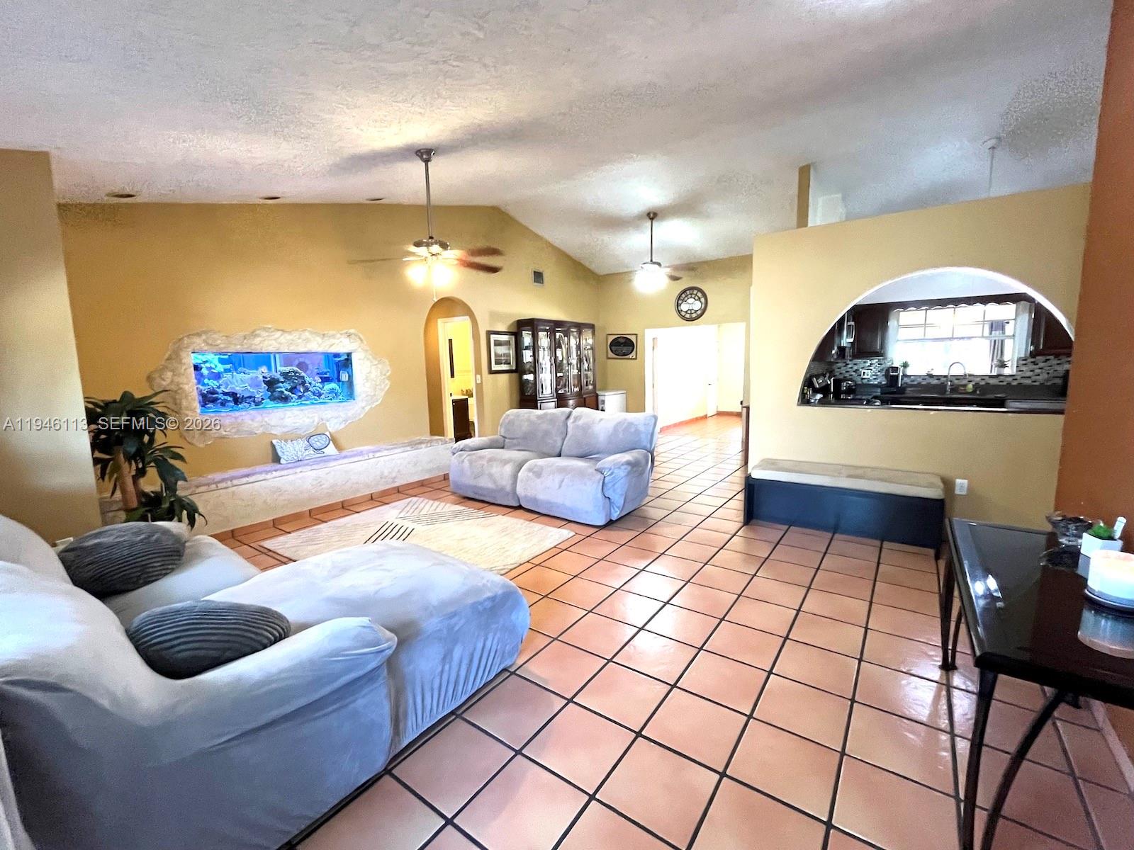 16200 Southwest 284th Street Homestead, FL 33033 - Photo 5 of 23 a bedroom with furniture and a wooden floor