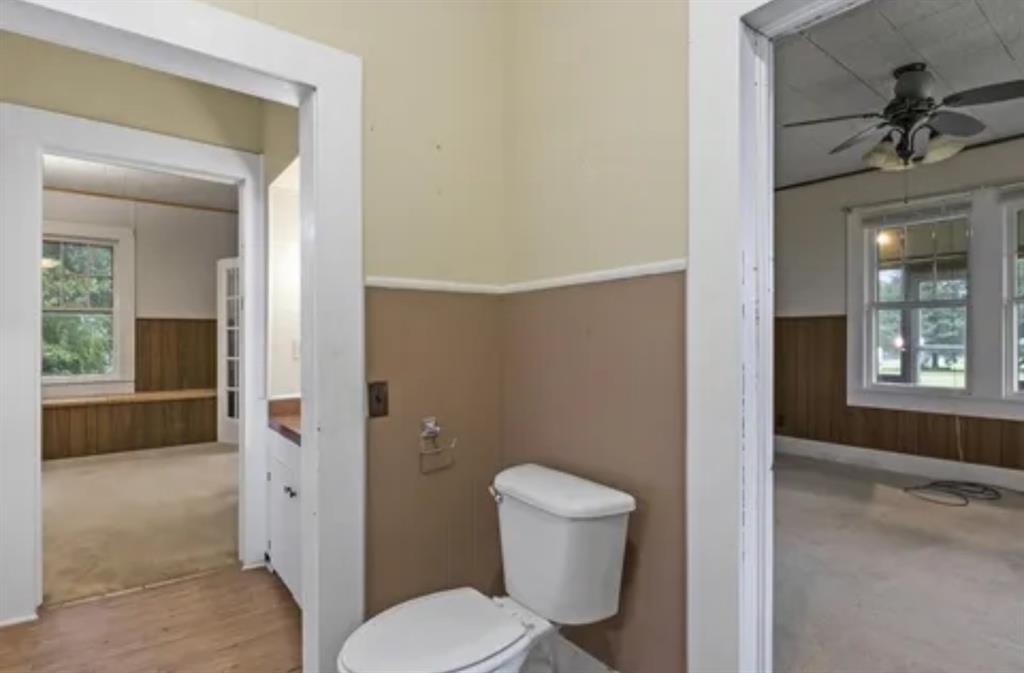 304 Daingerfield Street Naples, TX 75568 - Photo 11 of 25 a bathroom with a toilet