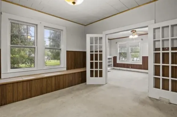a kitchen with stainless steel appliances granite countertop a stove and cabinets