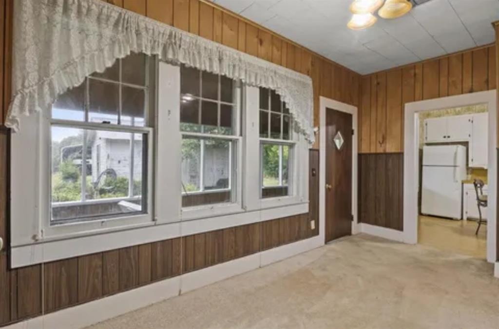 304 Daingerfield Street Naples, TX 75568 - Photo 19 of 25 a view of an empty room with a window