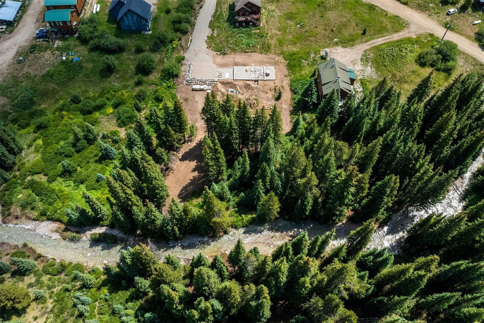 5400 Montezuma Road Montezuma, CO 80435 - Photo 6 of 31 an aerial view of residential house with outdoor space and trees all around