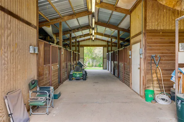 a view of a garage with wooden wall