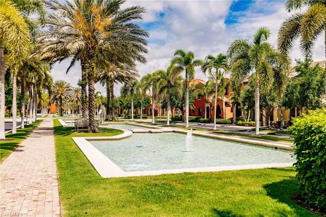 a view of a swimming pool with a yard