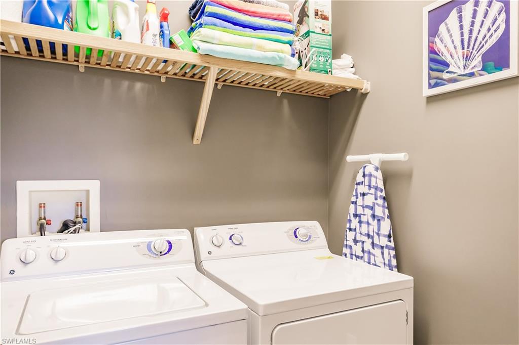 9081 Albion Lane South, Unit 6502 Naples, FL 34113 - Photo 17 of 37 a utility room with a washer and dryer