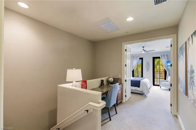 a walk in closet with a couch