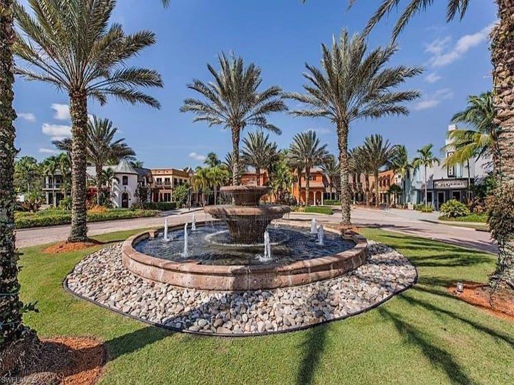 9081 Albion Lane South, Unit 6502 Naples, FL 34113 - Photo 7 of 37 a view of a house with swimming pool and a yard