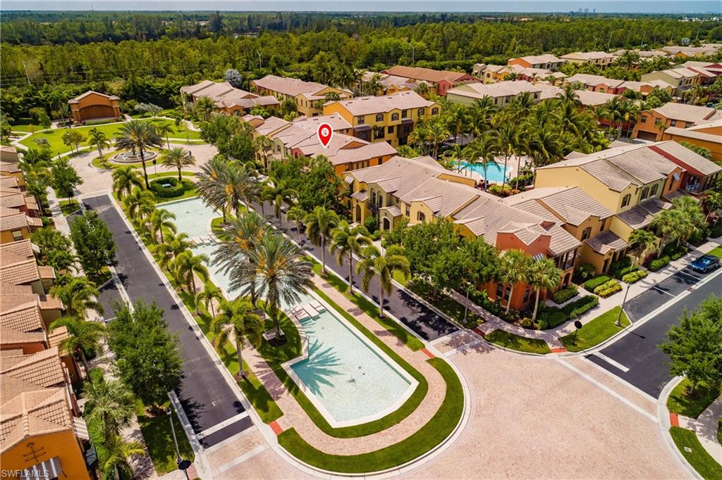 9081 Albion Lane South, Unit 6502 Naples, FL 34113 - Photo 9 of 37 an aerial view of residential houses with outdoor space and swimming pool
