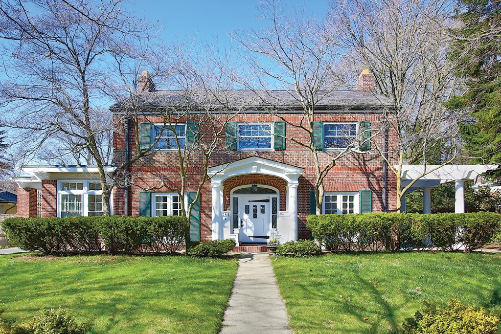 341 Commonwealth Avenue Newton, MA 02467 - Photo 1 of 11 a front view of a house with garden