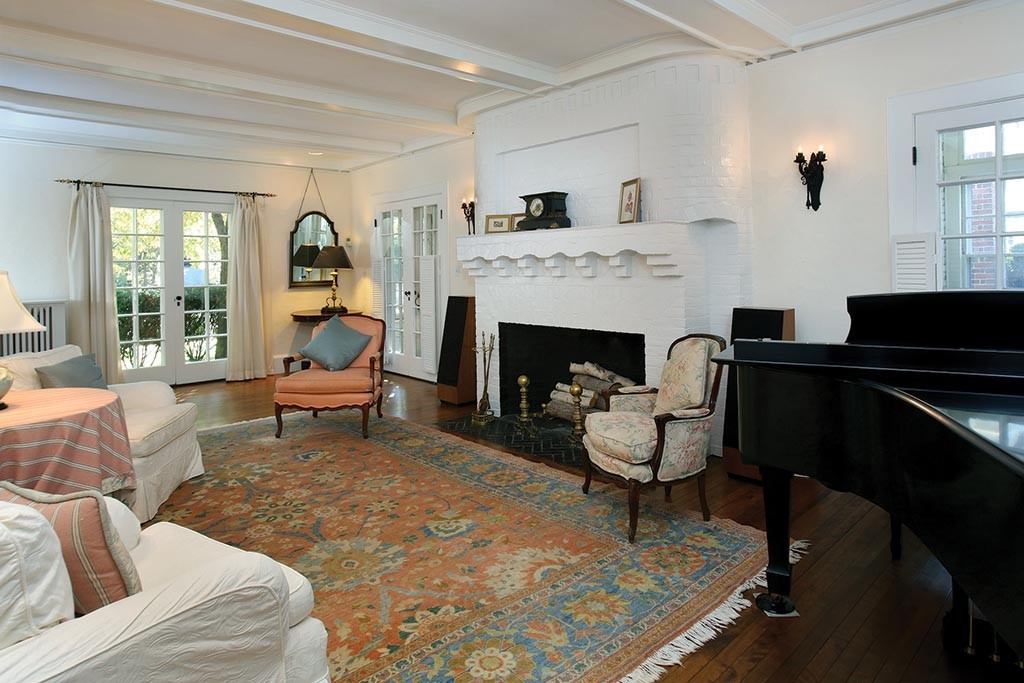 341 Commonwealth Avenue Newton, MA 02467 - Photo 3 of 11 a living room with furniture and a fireplace
