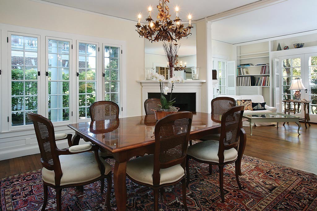 341 Commonwealth Avenue Newton, MA 02467 - Photo 4 of 11 a dining room with furniture a chandelier and wooden floor
