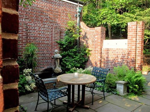 341 Commonwealth Avenue Newton, MA 02467 - Photo 10 of 11 a view of a table and chairs in back yard of a house