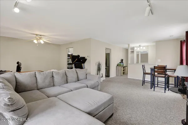a view of a workspace with furniture