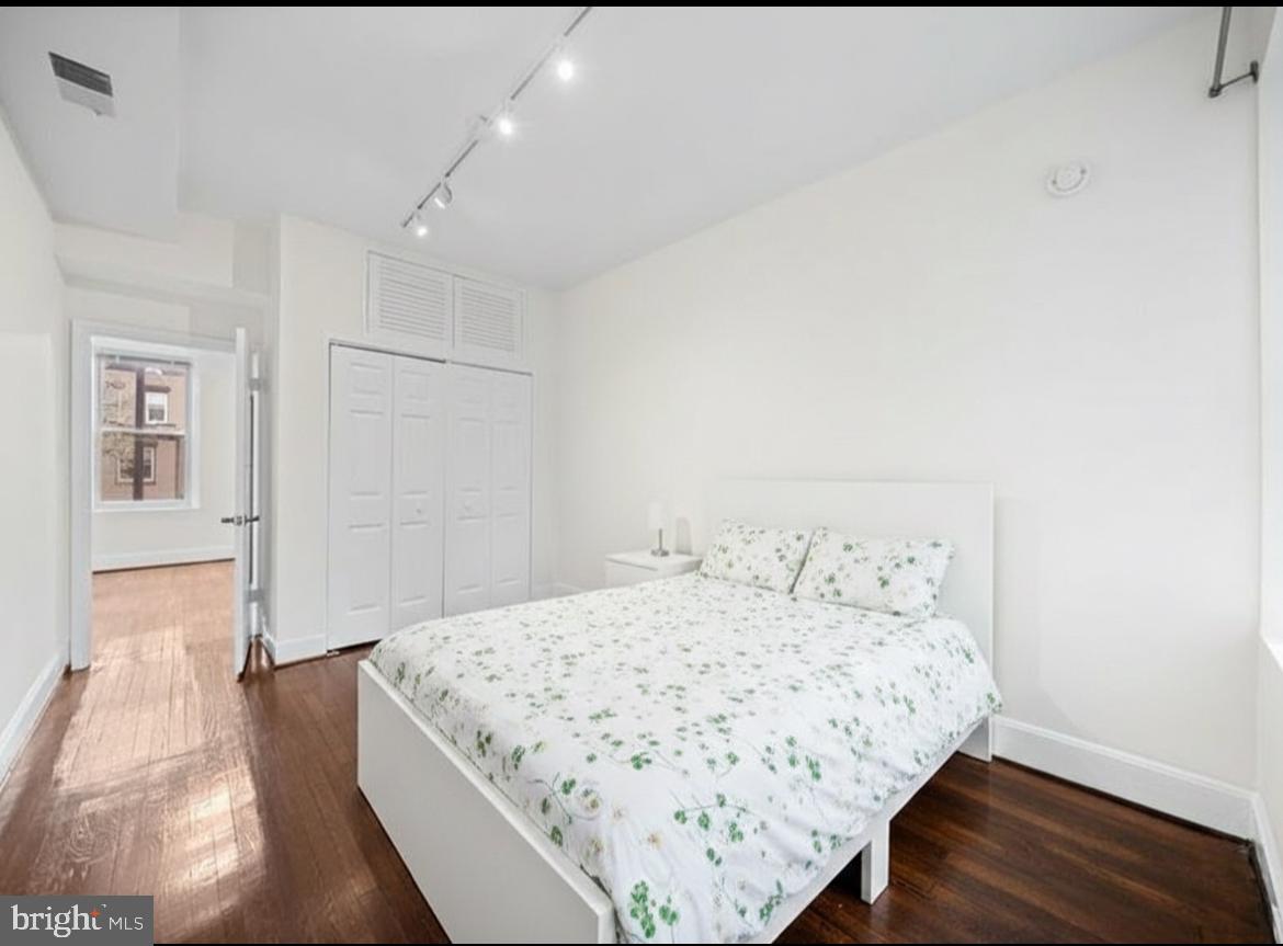 1706 U Street Northwest, Unit 202 Washington, DC 20009 - Photo 3 of 17 Bright and airy bedroom retreat.