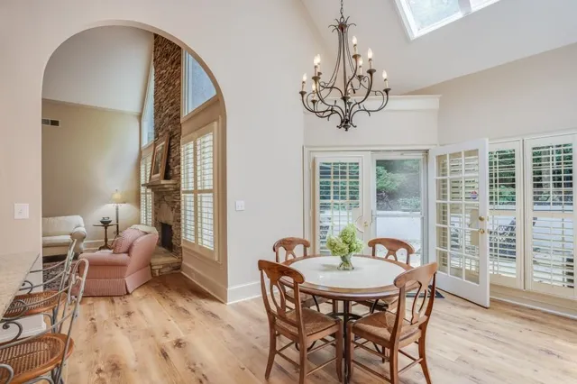 a view of a dining room with furniture window and outside view