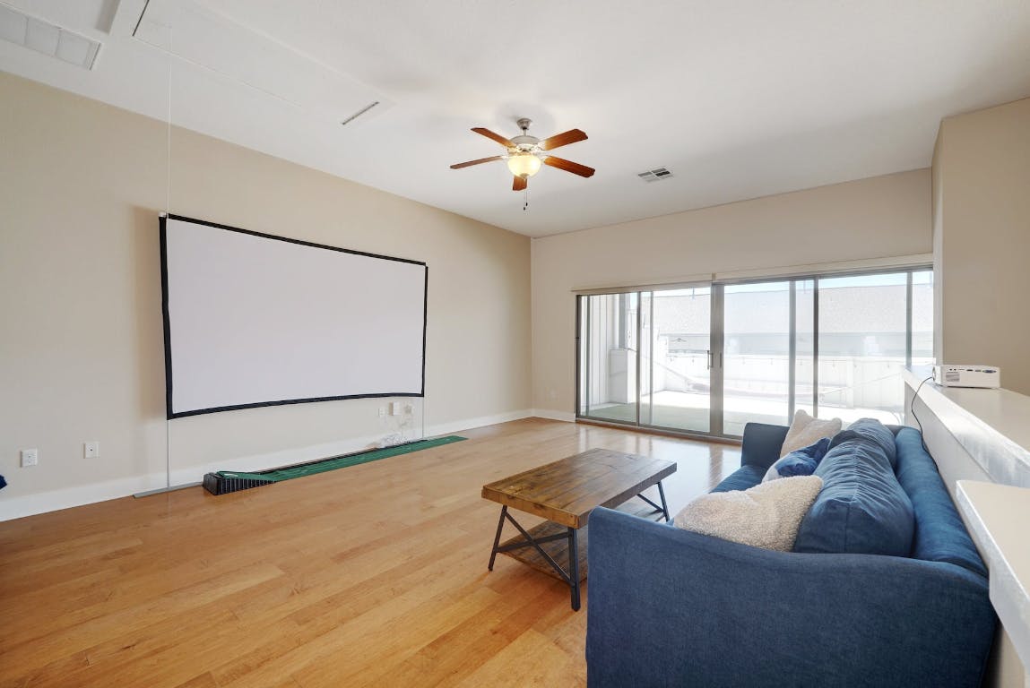 2520 Bluebonnet Lane, Unit 41 Austin, TX 78704 - Photo 21 of 30 a living room with furniture and a large window