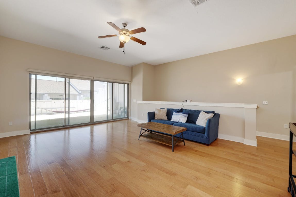 2520 Bluebonnet Lane, Unit 41 Austin, TX 78704 - Photo 22 of 30 a living room with furniture and a large window