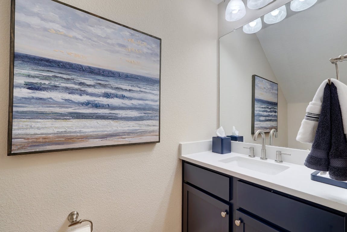 2520 Bluebonnet Lane, Unit 41 Austin, TX 78704 - Photo 24 of 30 a bathroom with a sink and a mirror