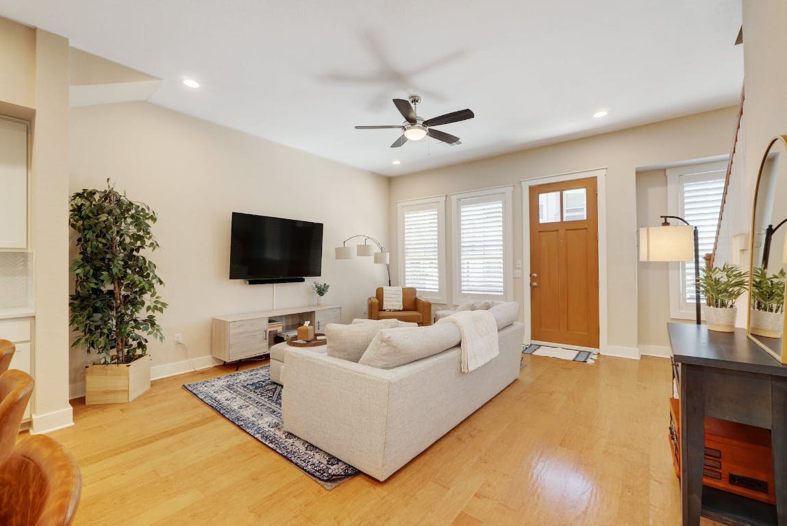 2520 Bluebonnet Lane, Unit 41 Austin, TX 78704 - Photo 6 of 30 a living room with furniture and a flat screen tv