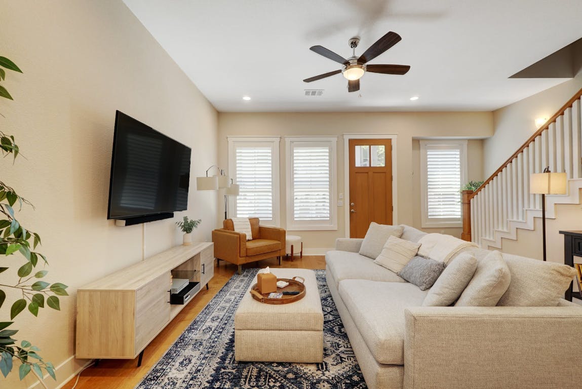 2520 Bluebonnet Lane, Unit 41 Austin, TX 78704 - Photo 7 of 30 a living room with furniture and a flat screen tv